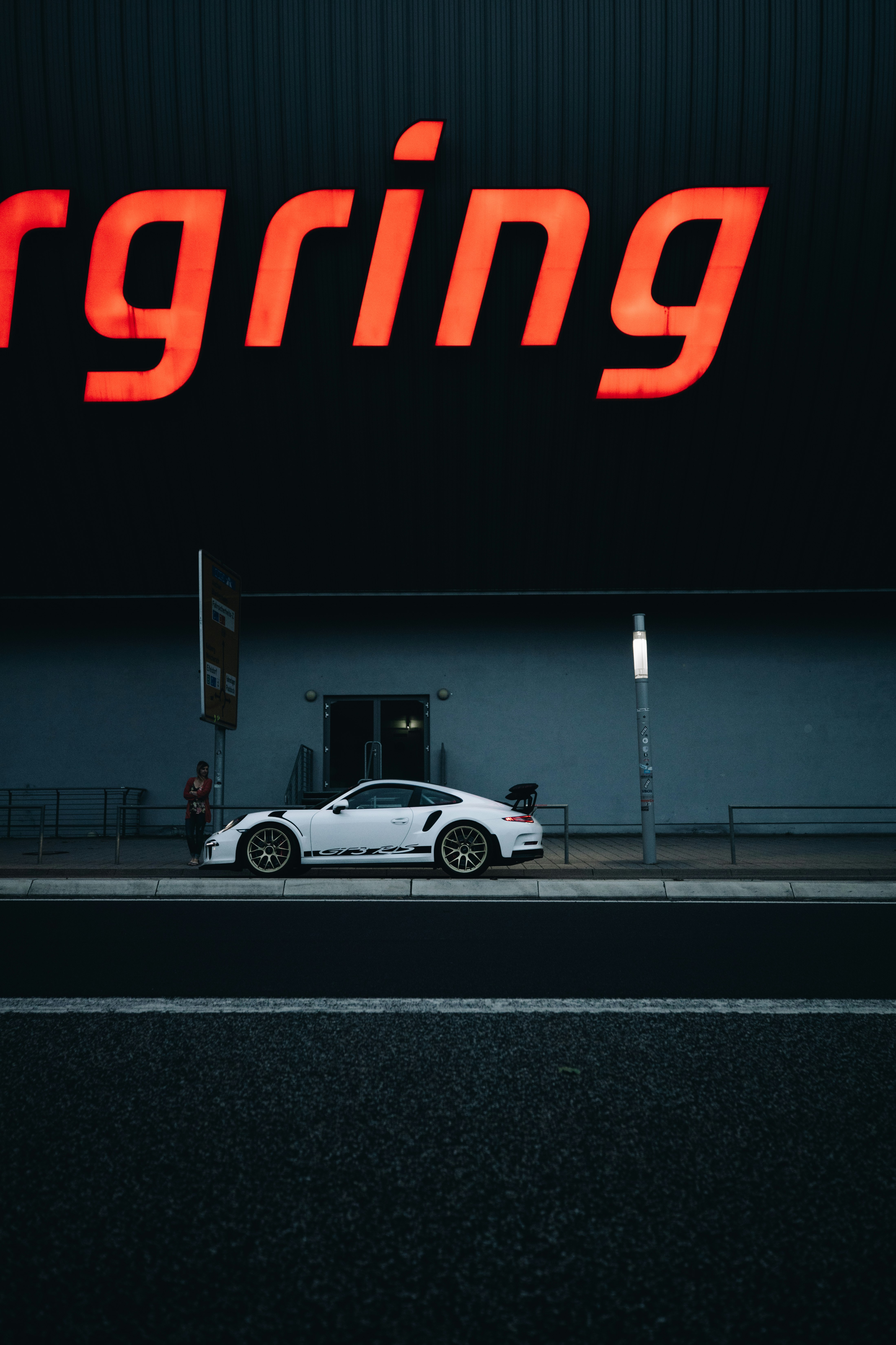 white and black car on road